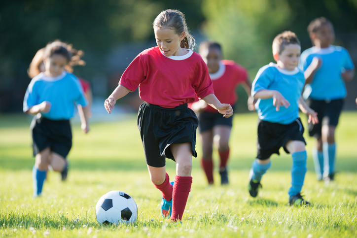 Children playing soccer