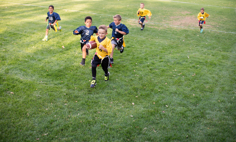 Boys playing flag football