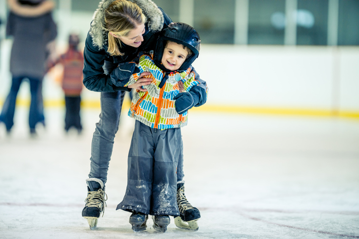 Child skating with mom
