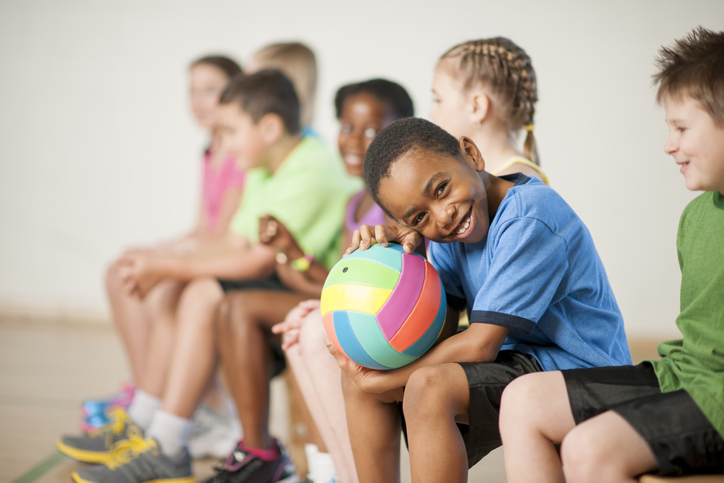 boy with volleyball