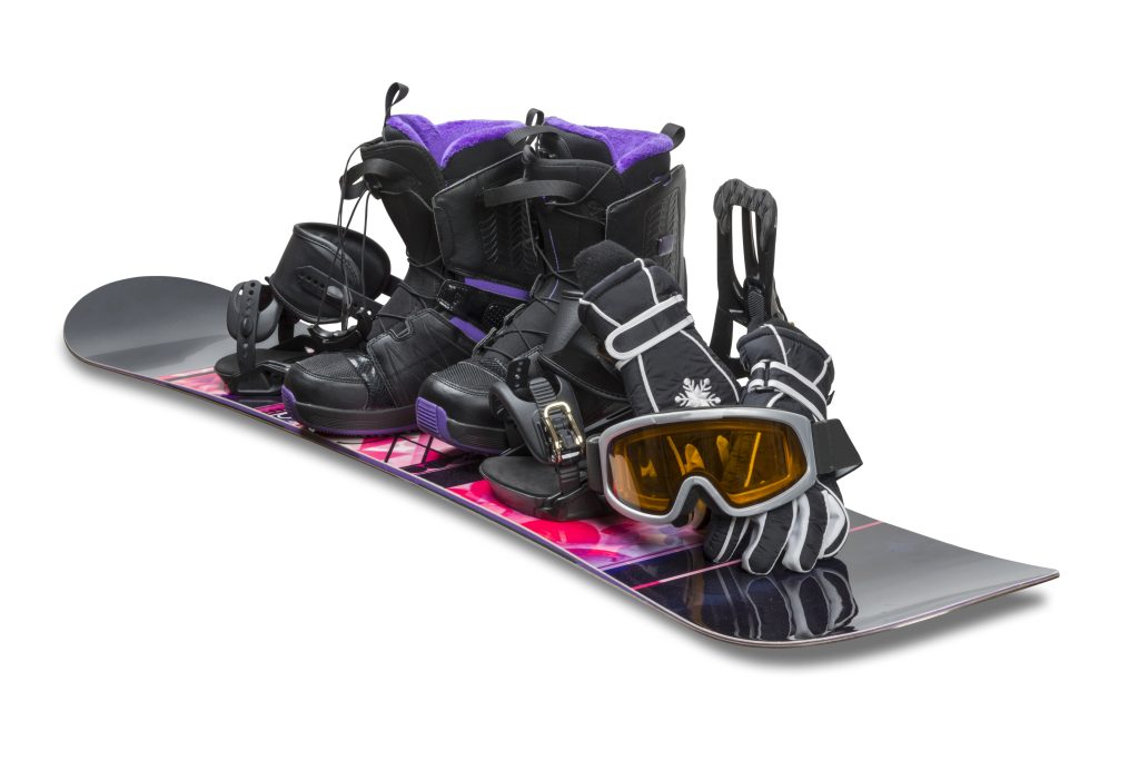 Snowboard with boot, gloves and goggles