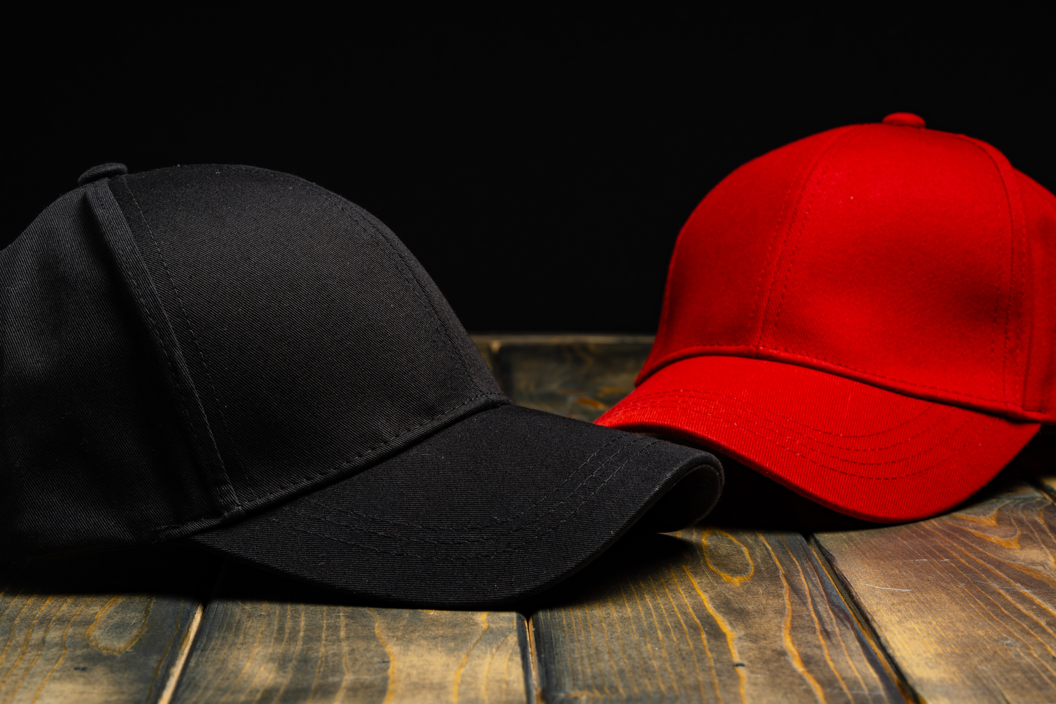 Baseball cap against black background studio shot