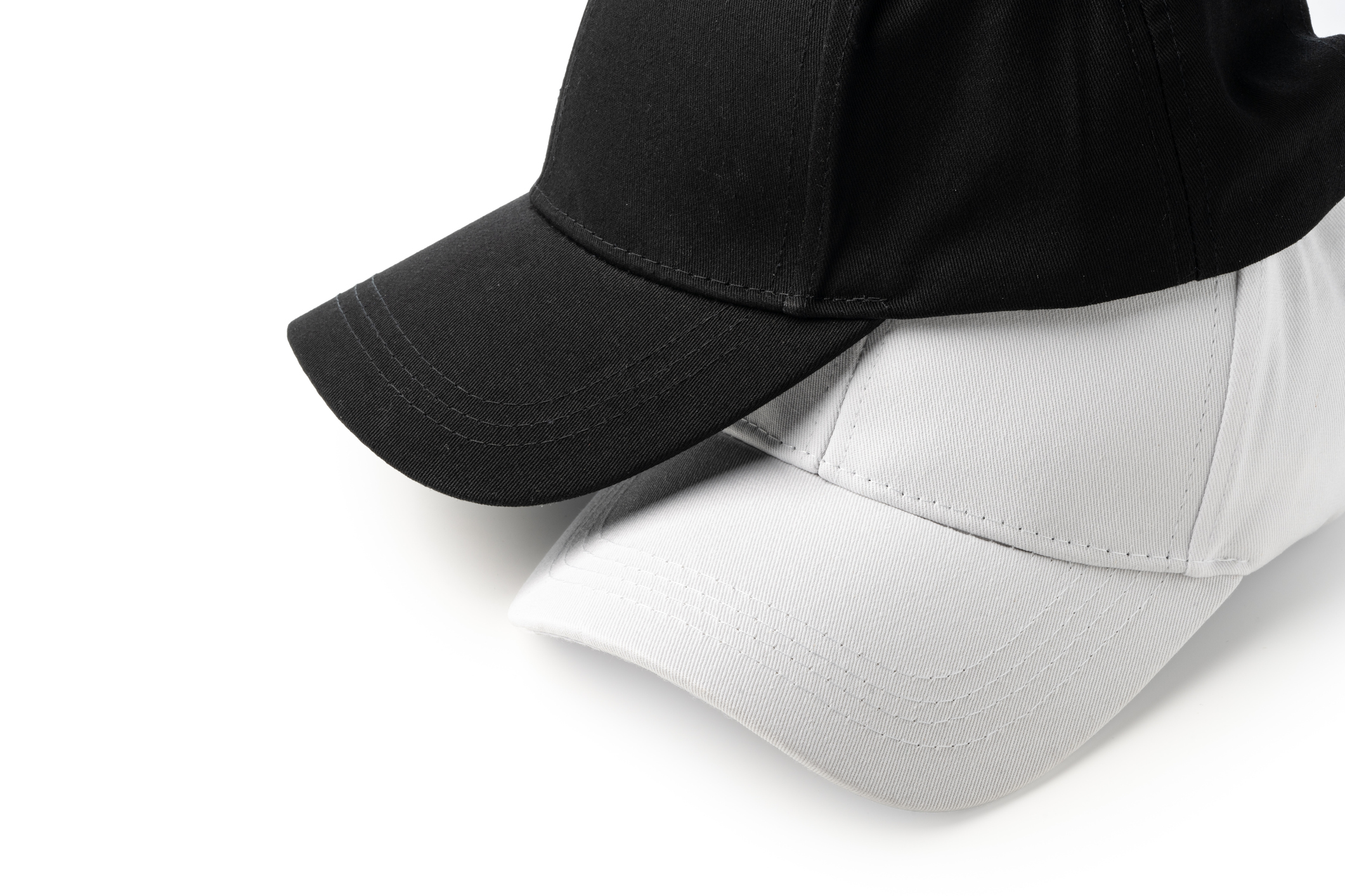 Two White and Black Hats on a White Background