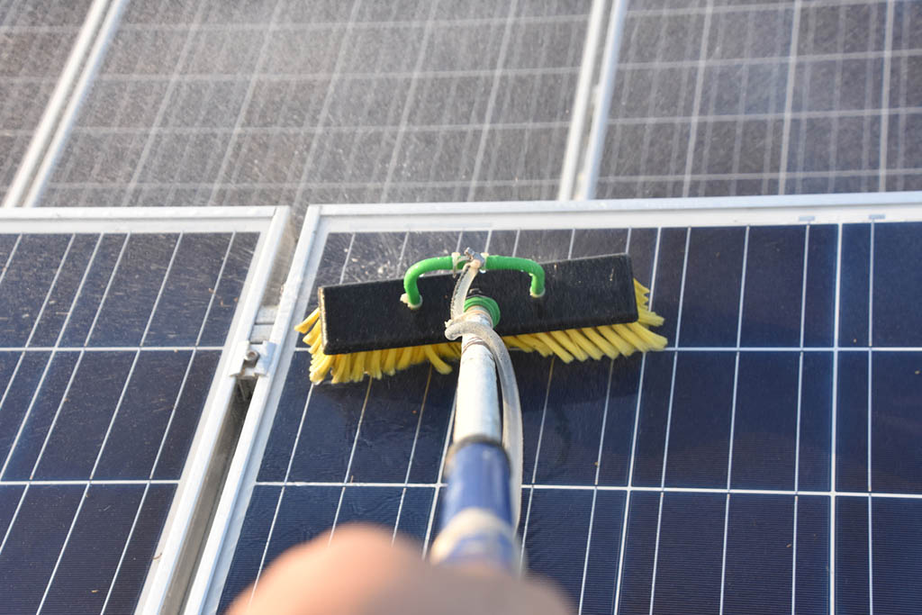 Cleaning a solar roof